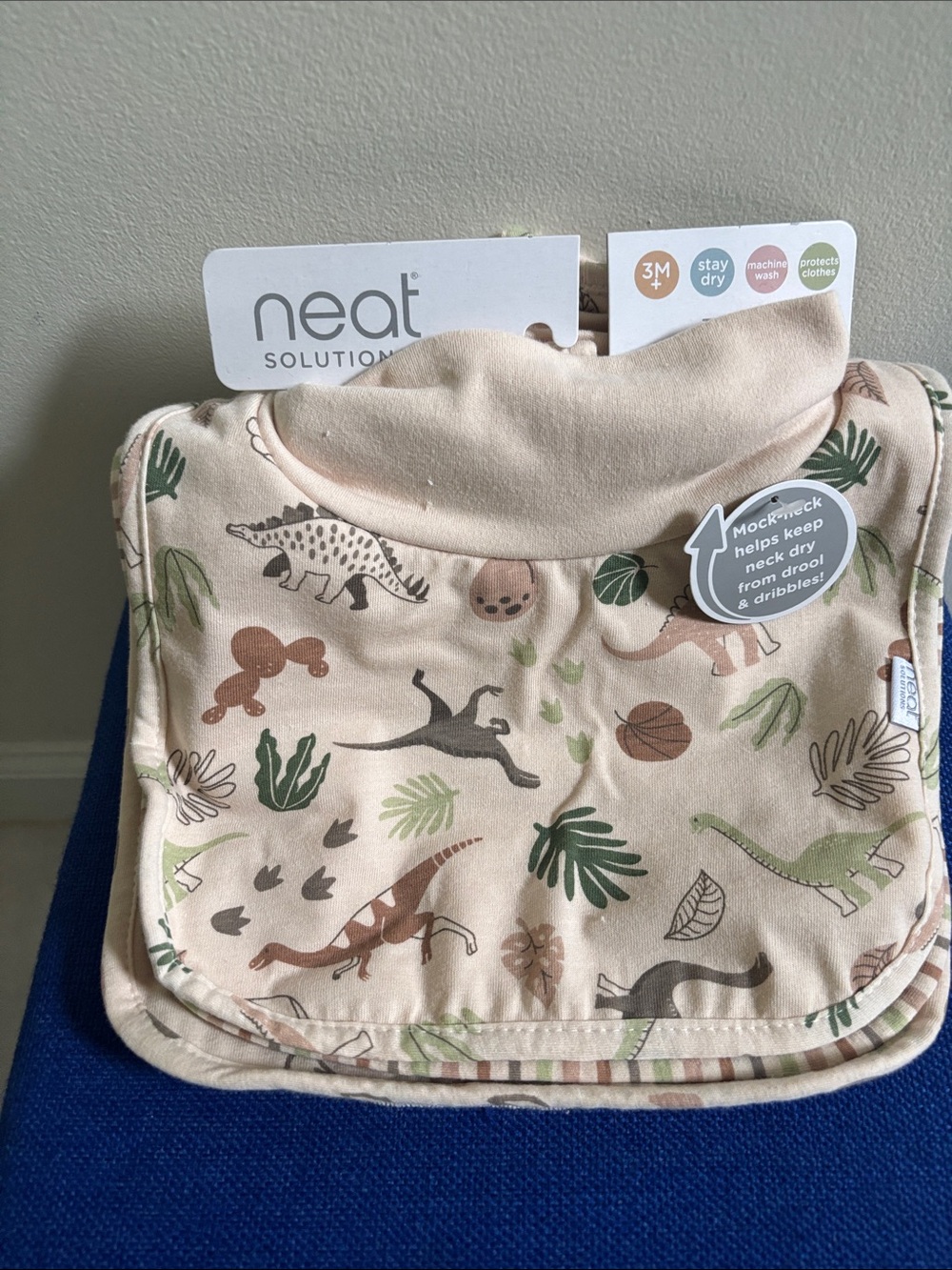 Neat Solutions Beige Dinosaur Print Kids Bib - Stay-Dry Neck Protection